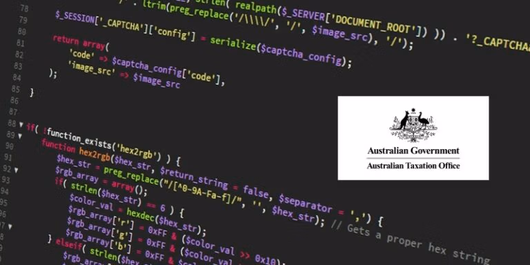 Code on a screen with ato logo overlay ‣ boss intelligence ‣ boss intelligence