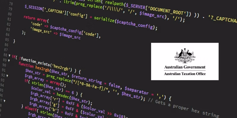 Code on a screen with ato logo overlay ‣ boss intelligence ‣ boss intelligence